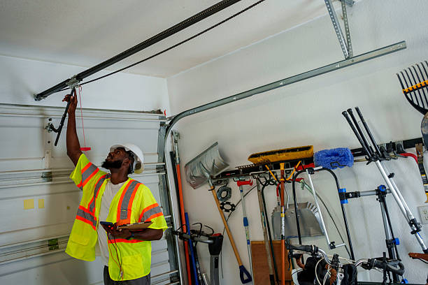 Professional Garage Door Panel Replacement technician working in Lake Placid, NY